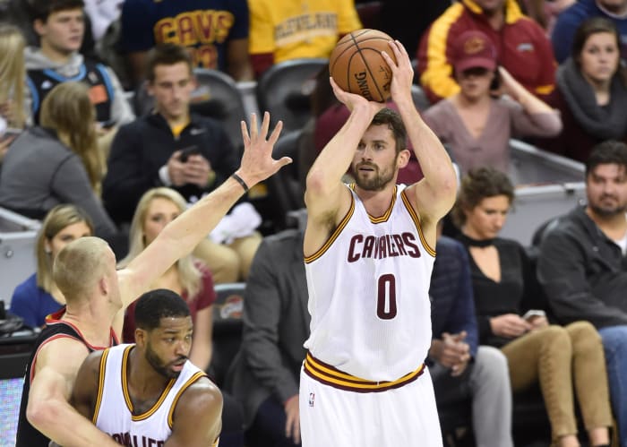 Nov 23, 2016; Cleveland, OH, USA; Cleveland Cavaliers forward Kevin Love (0) makes a three point basket in the first quarter against the Portland Trail Blazers at Quicken Loans Arena. Mandatory Credit: David Richard-USA TODAY Sports